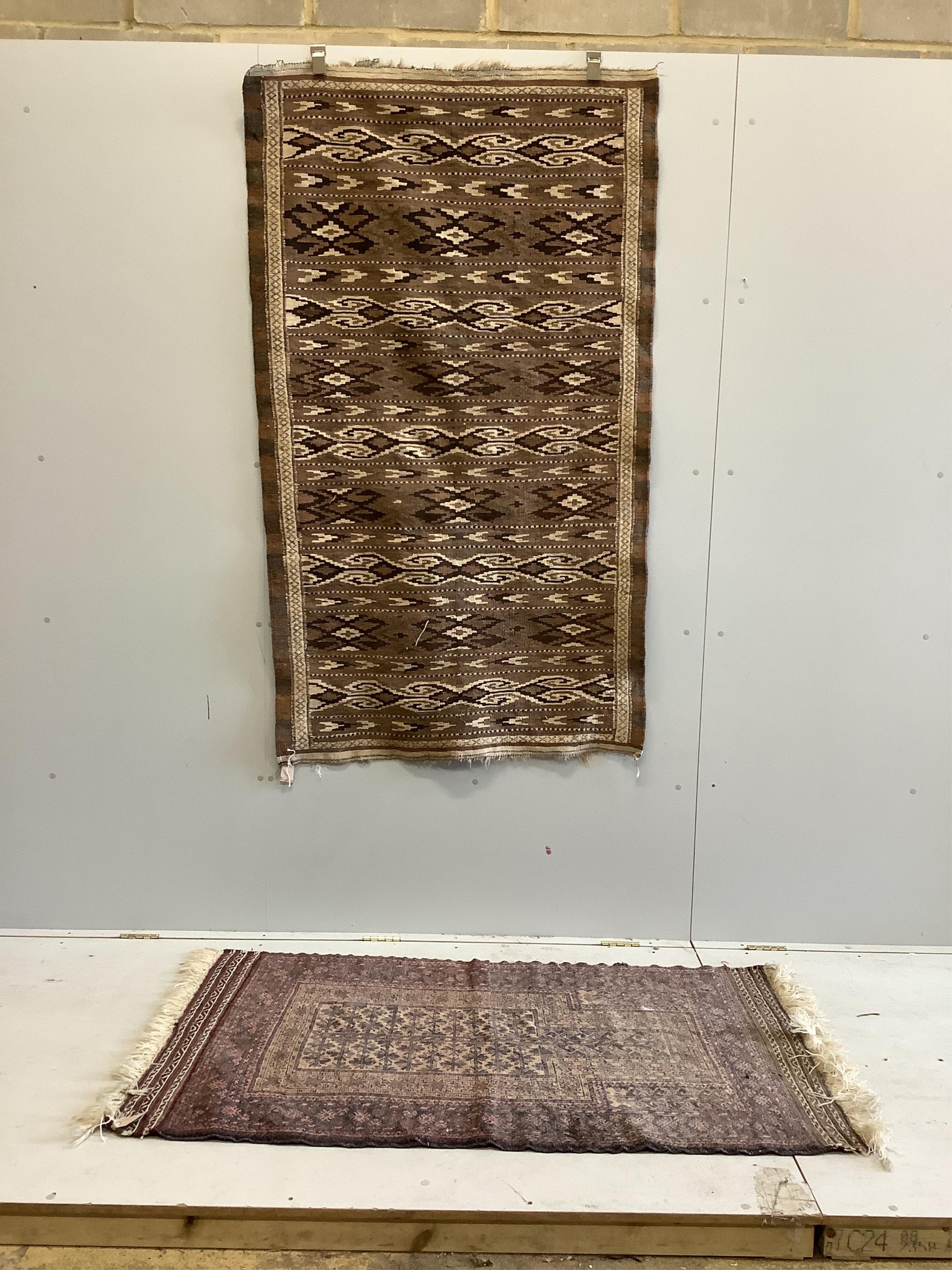 A Kilim flat weave rug together with a Belouch prayer rug, larger 180 x 147cm. Condition - fair